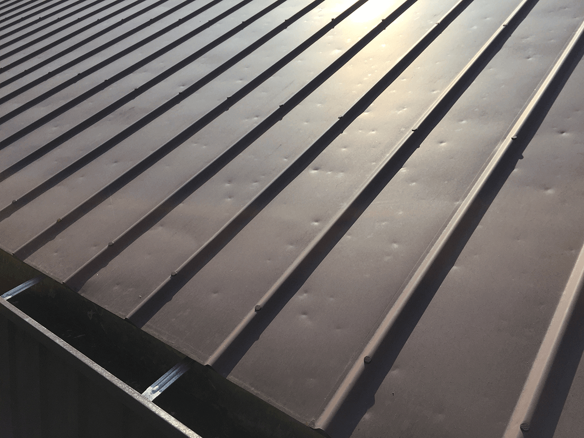 hail-damage-to-a-metal-roof-2021-08-30-16-27-00-utc hail-damage-to-a-metal-roof-2021-08-30-16-27-00-utc